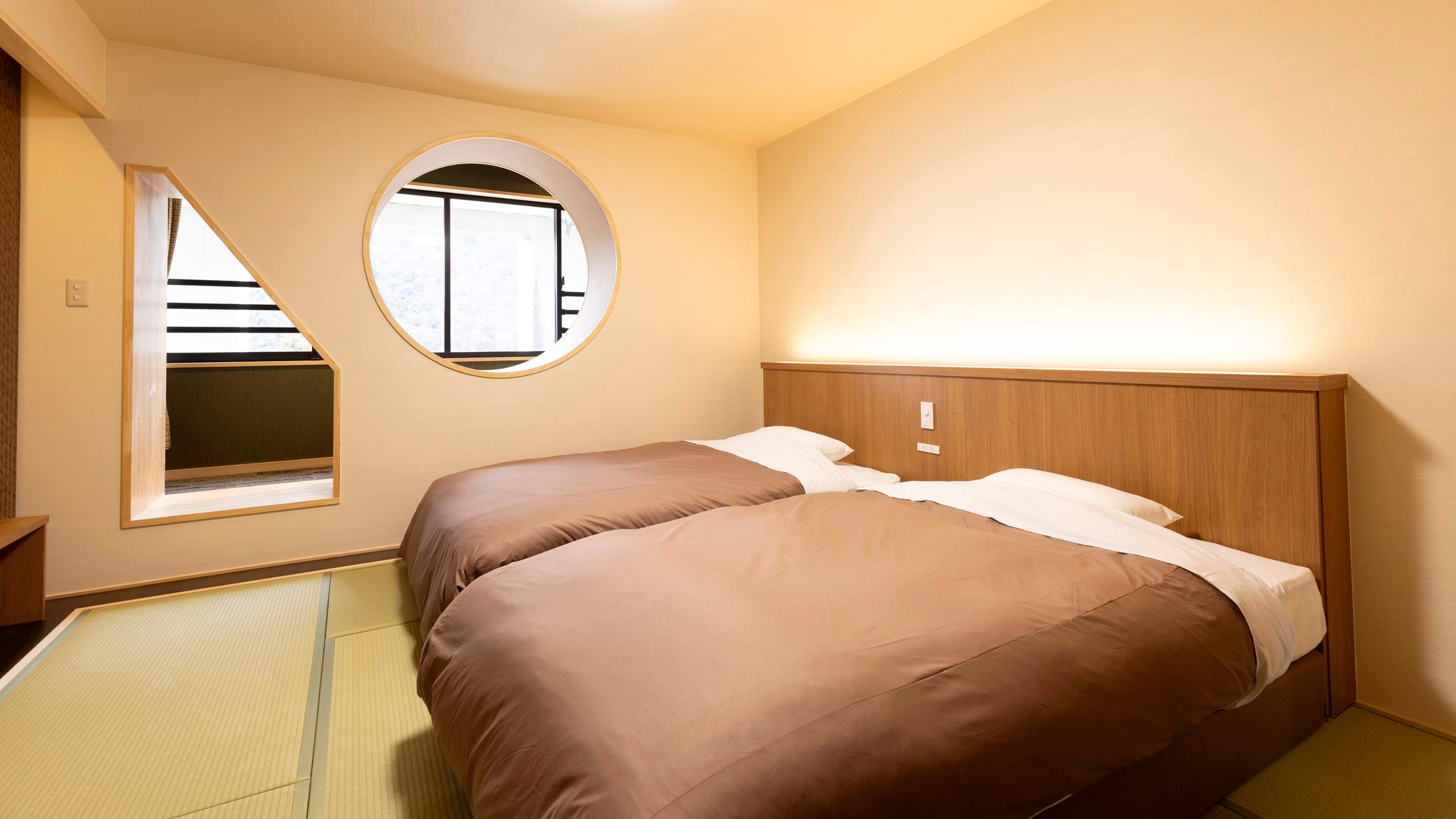 Giường đôi tiêu chuẩn theo phong cách Nhật Bản *Ví dụ về phòng dành cho khách