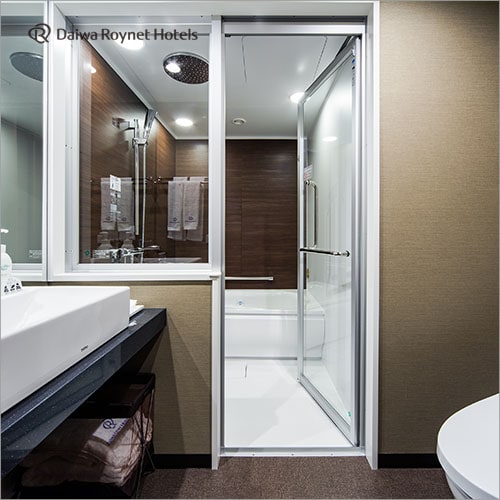 Semi-separate bathroom with overhead shower