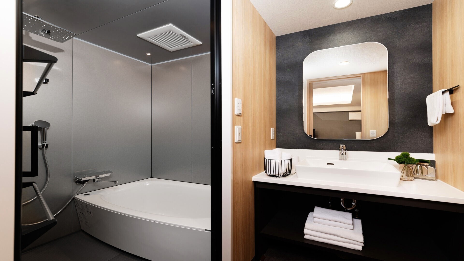 The sink and bathroom are separate
