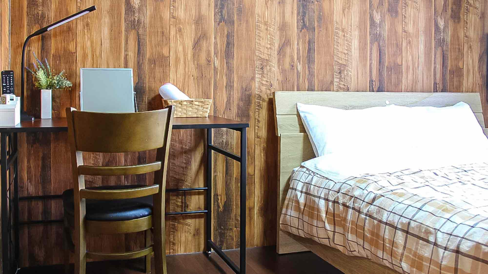 ・ Room 301, bedroom with desk and makeup mirror