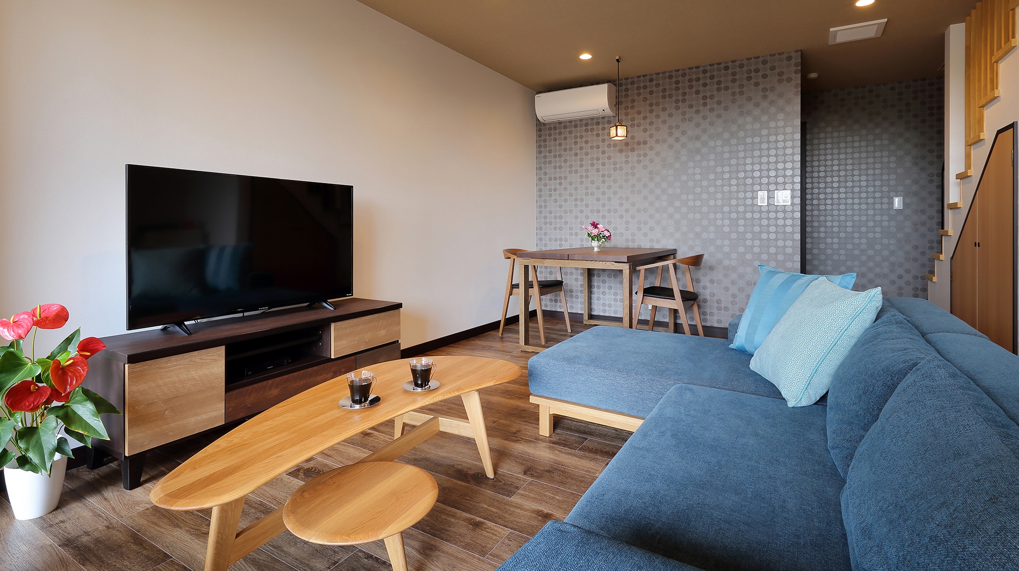 Enjoy a relaxing holiday on the large sofa in the living room.