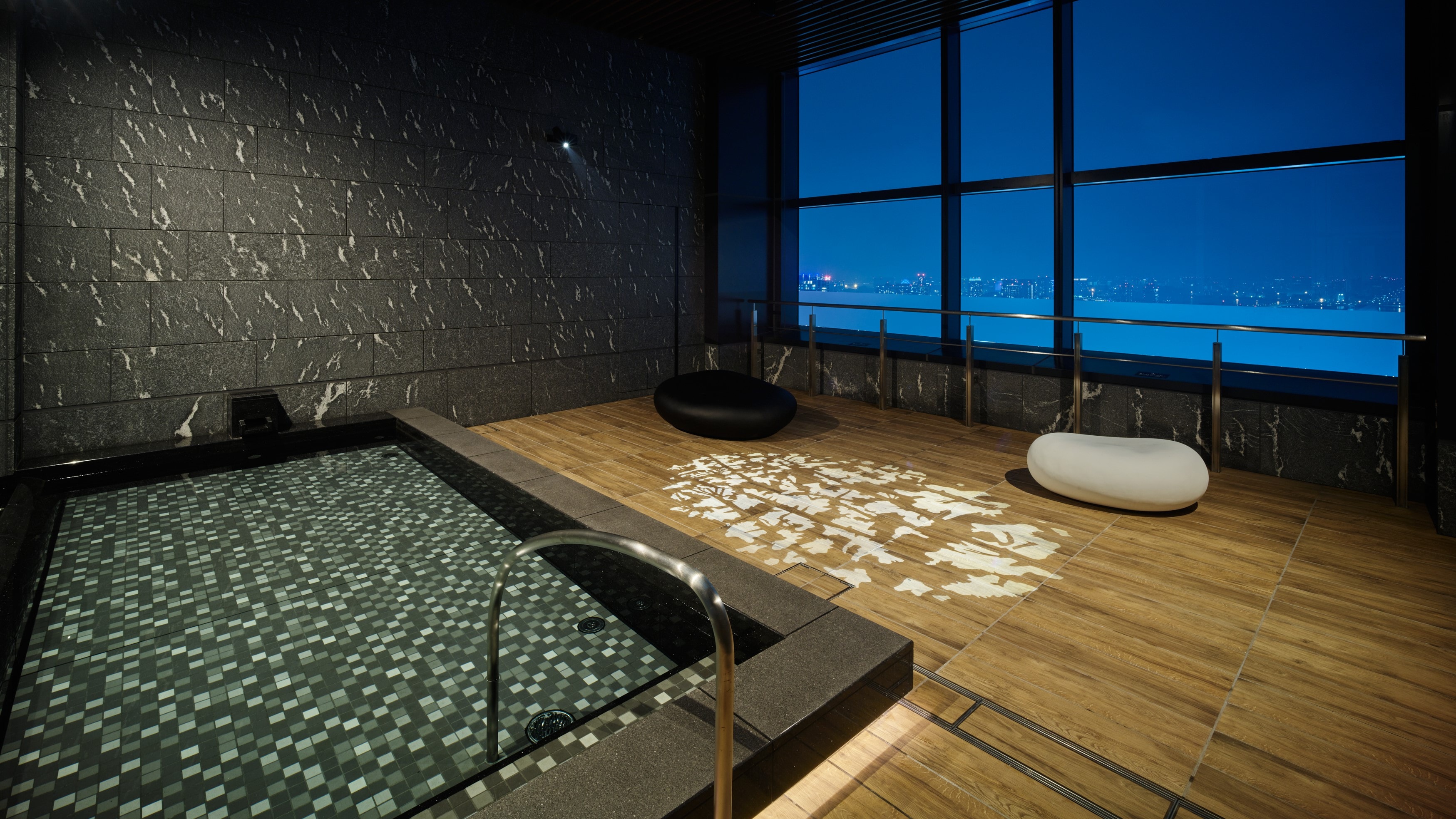 Large communal bath exclusively for hotel guests