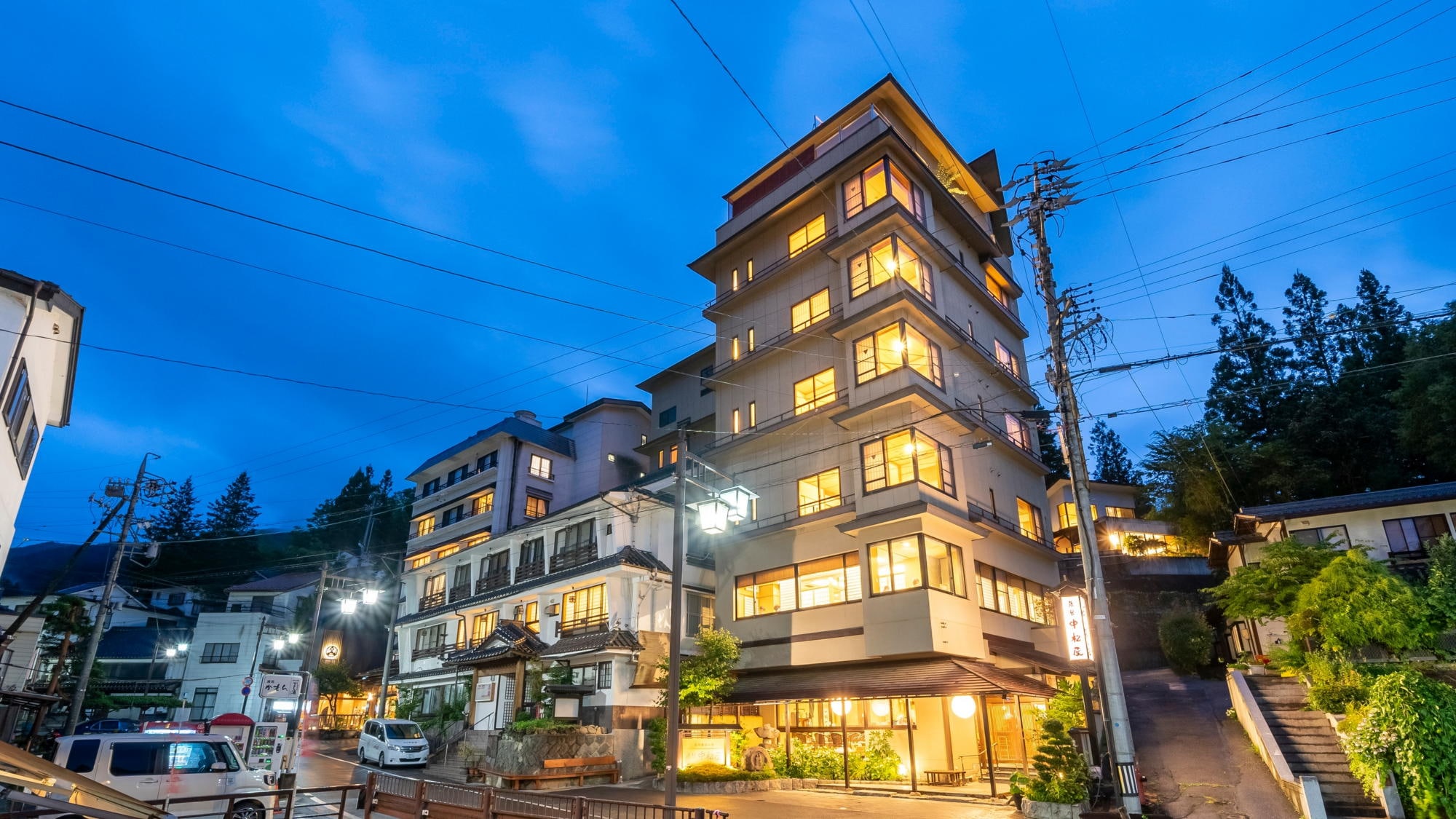 Nakamatsuya Ryokan exterior at night