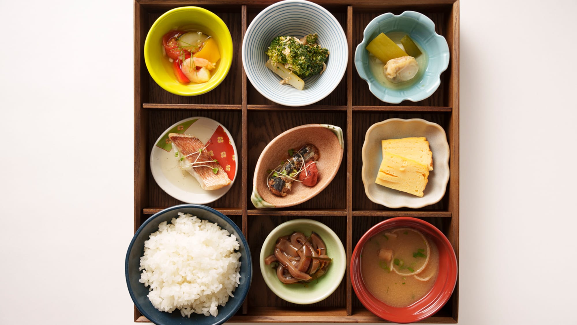 Breakfast [Buffet of colorful small bowls]