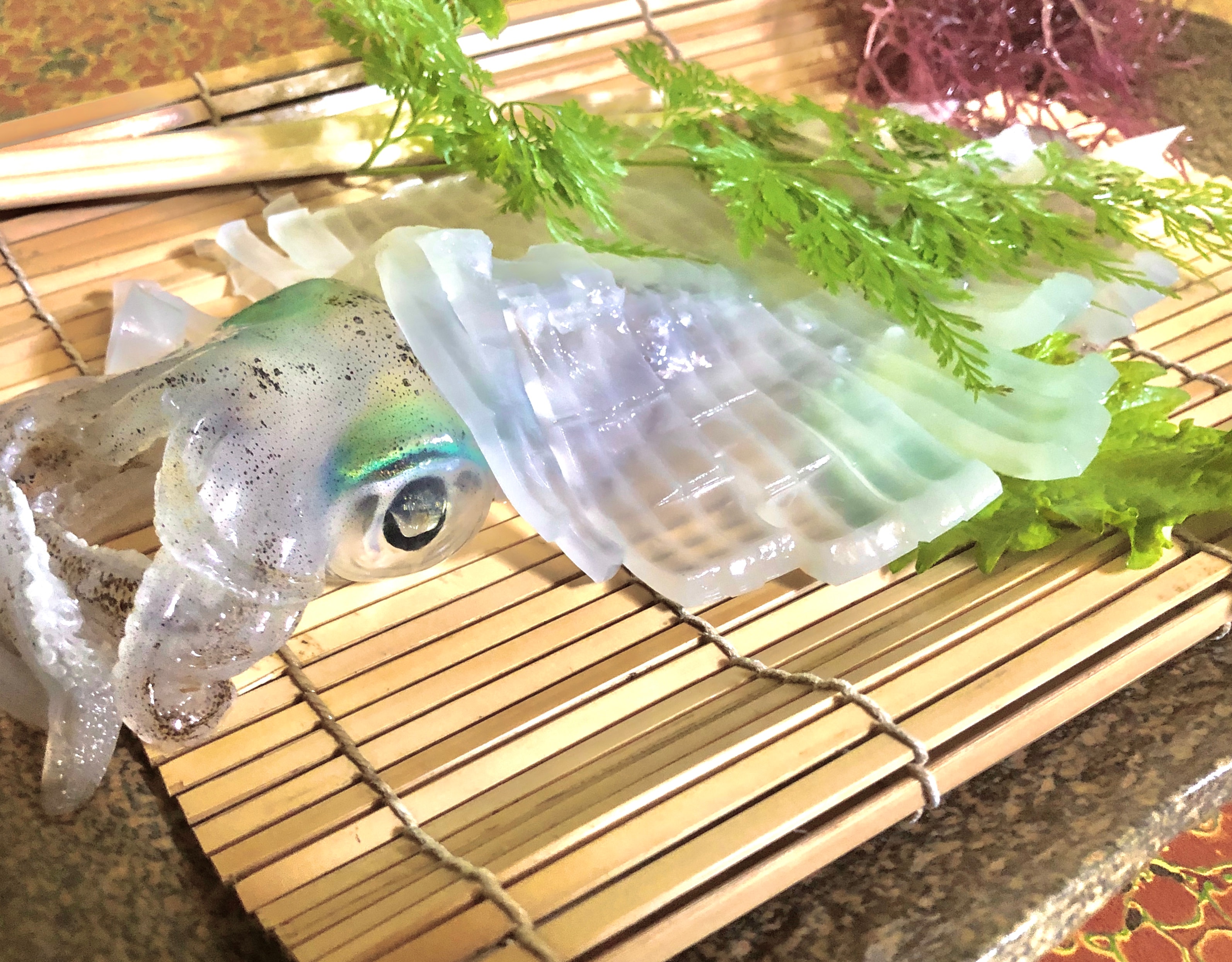 Live squid sashimi