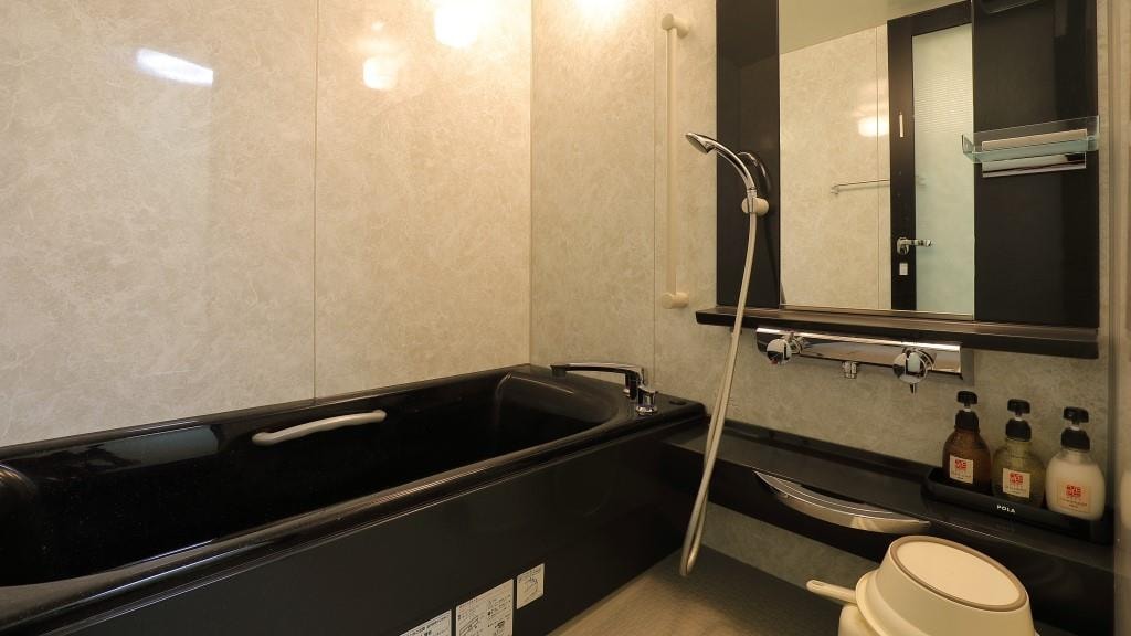 The main building 3rd floor has a large bathroom with a washing area.