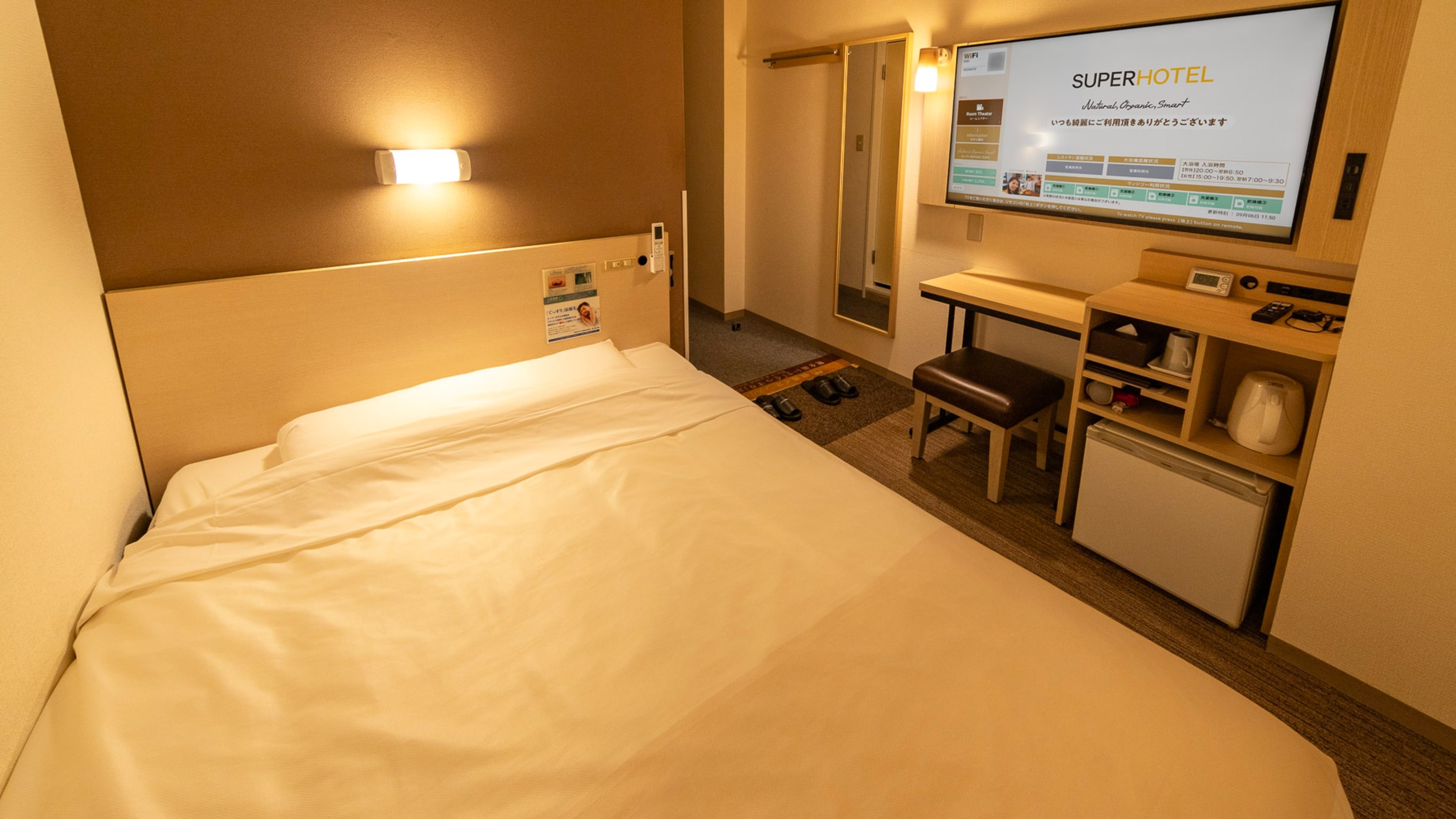 At night, the room is enveloped in soft light.