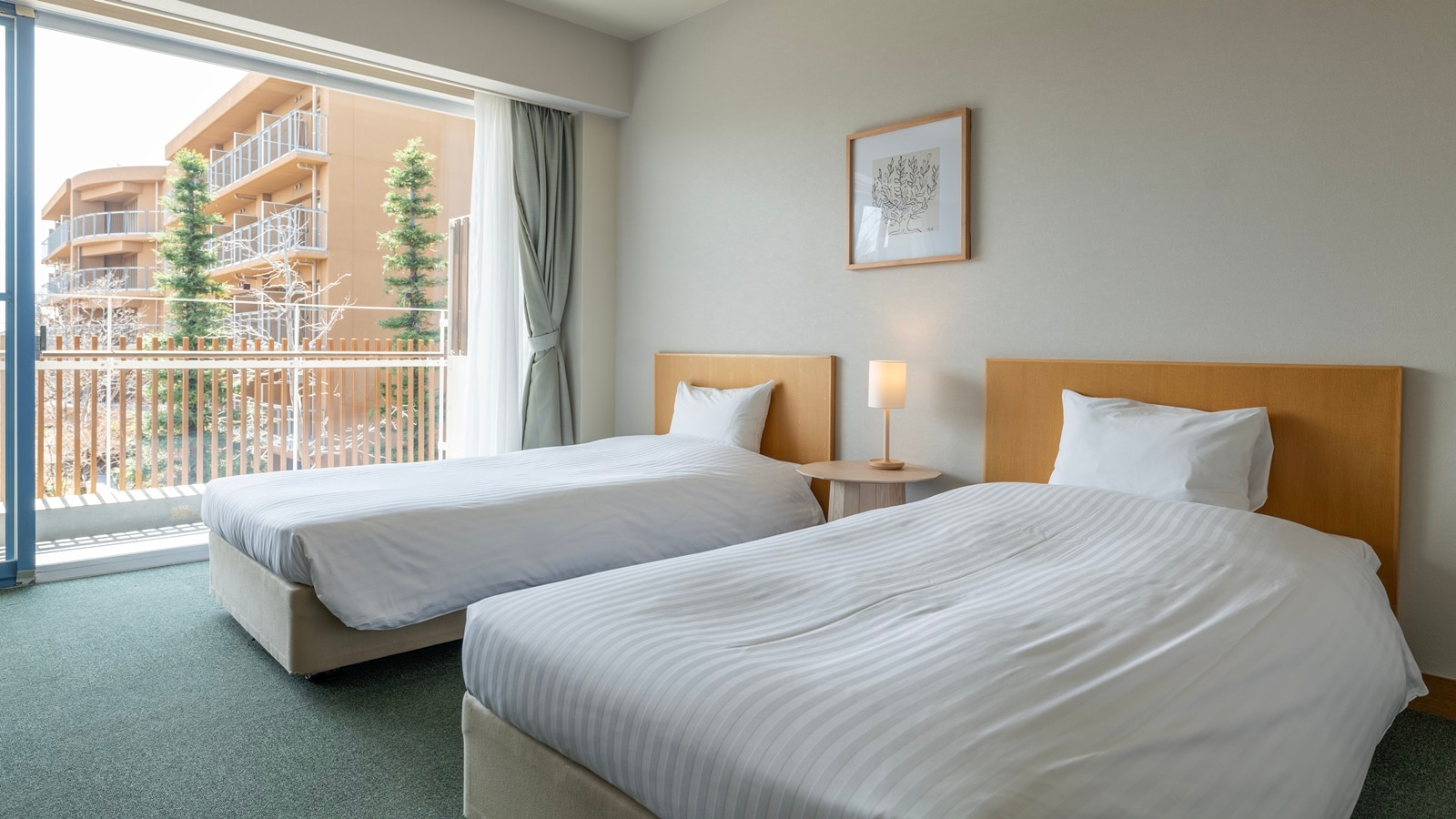*[Example of a twin room in the main building] A clean and spacious twin room perfect for staying with a loved one