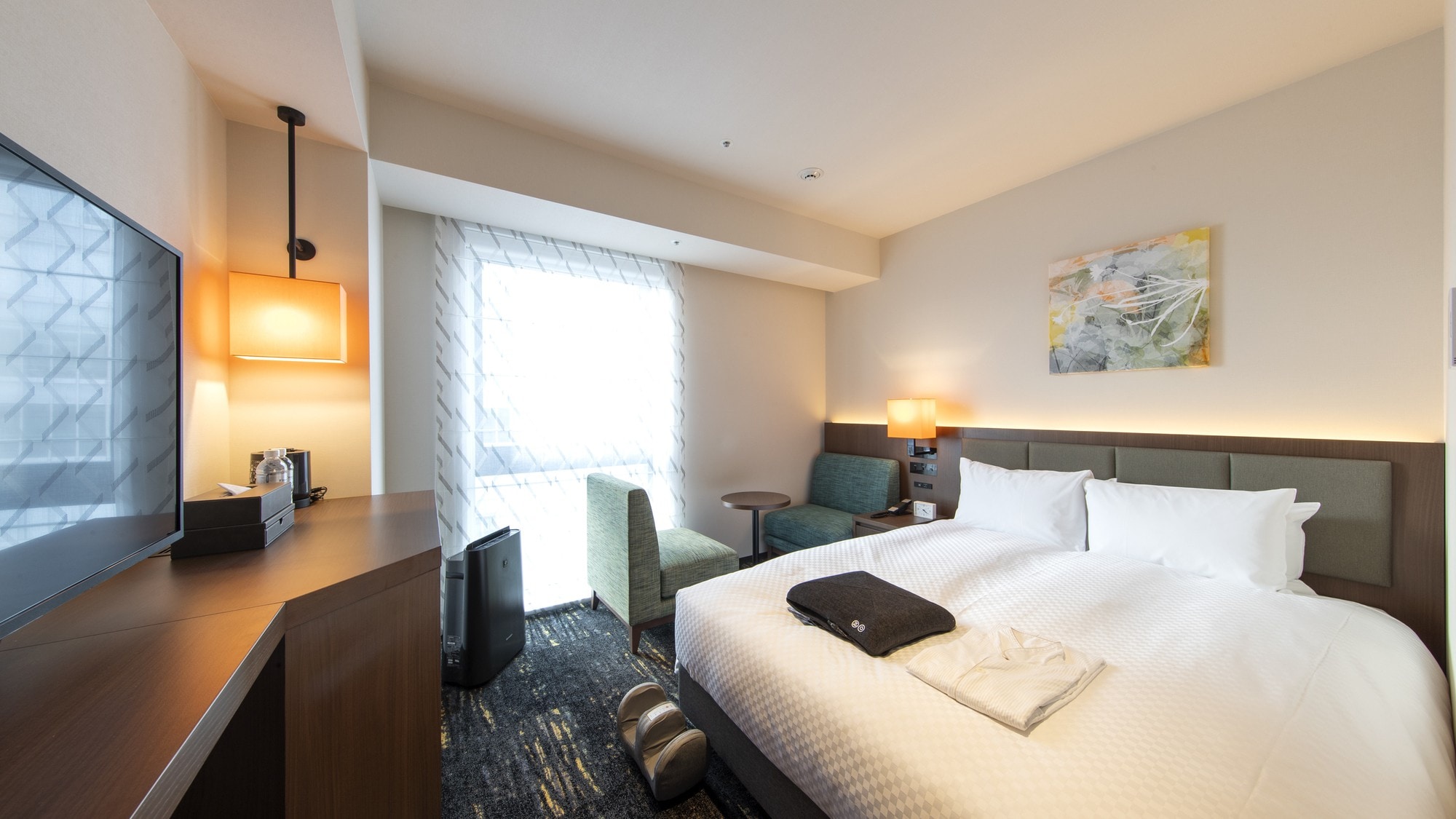 Room "Refresh Double" equipped with massage cushions and foot massagers