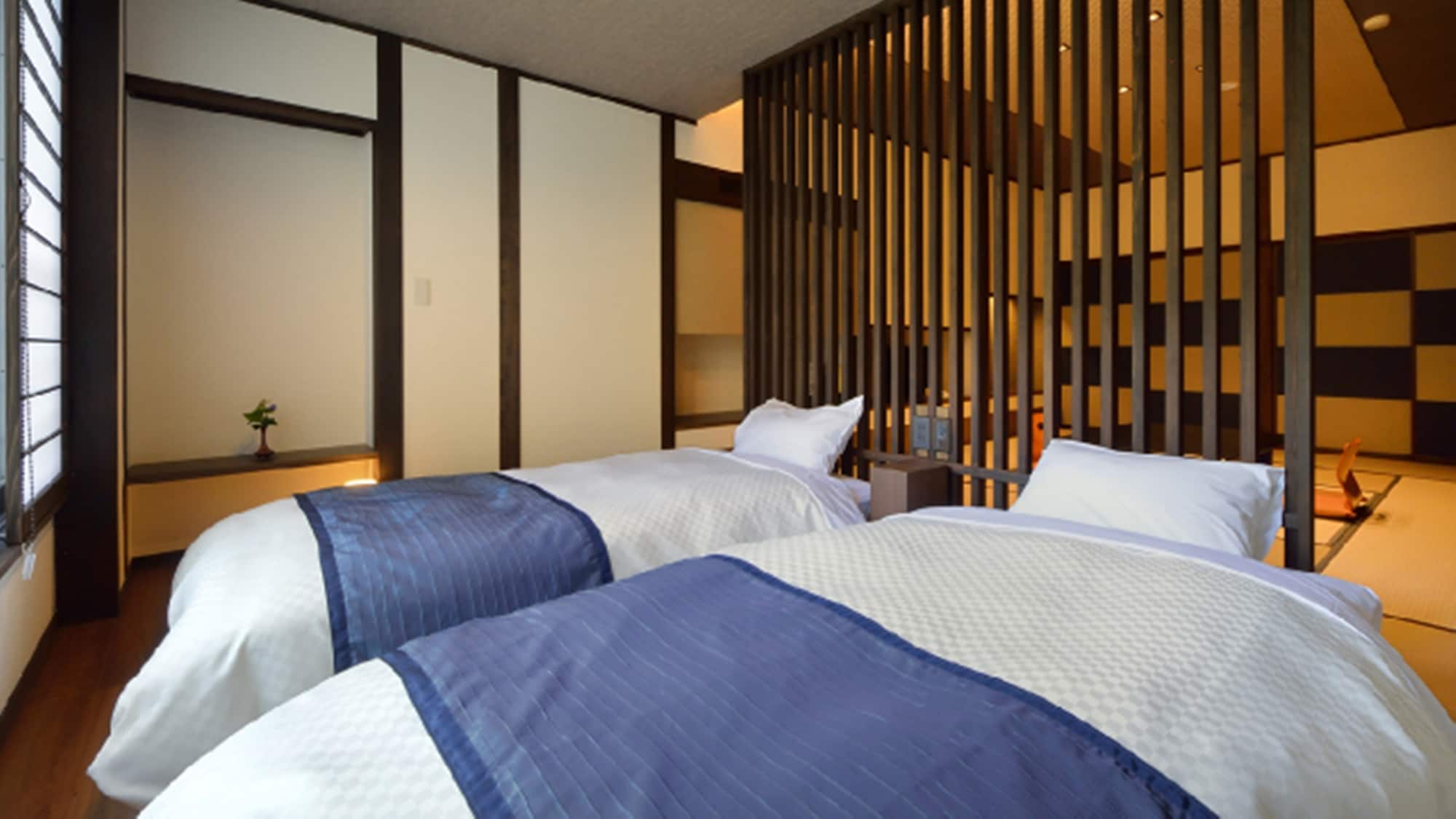 *[Top floor, modern Japanese-Western style room, 8 tatami mats + twin bed] A room with a great view