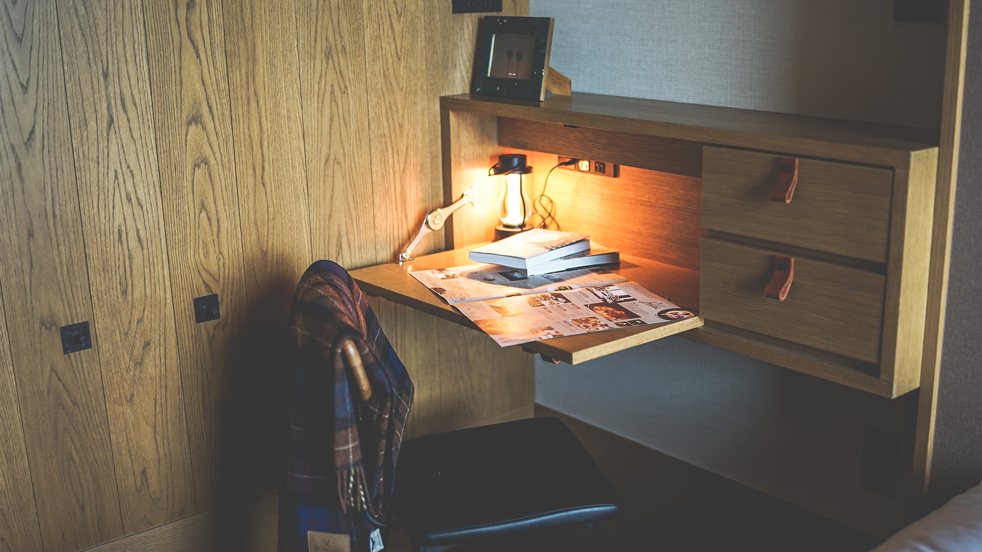 A desk space on the bedside. Compact yet comfortable design.