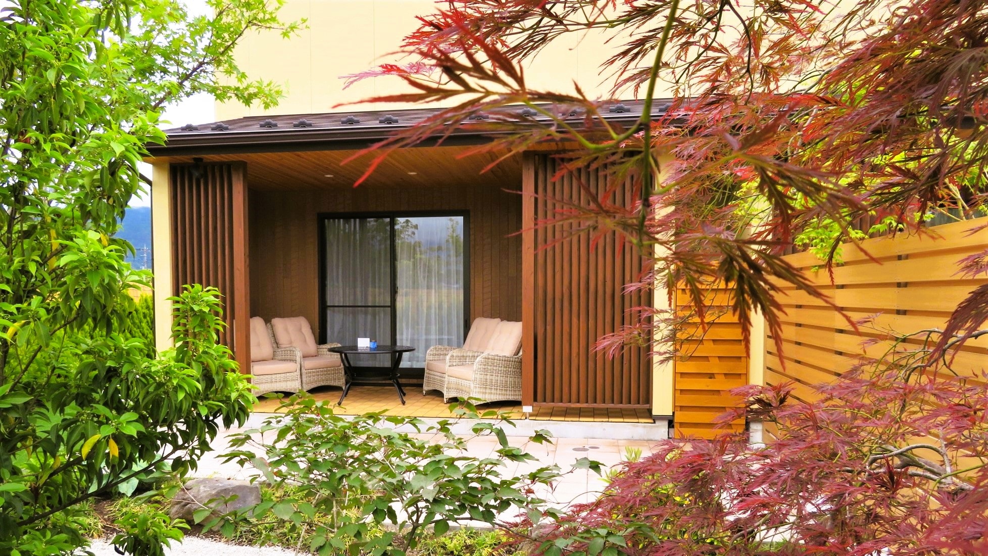 Garden terrace of guest room with small garden