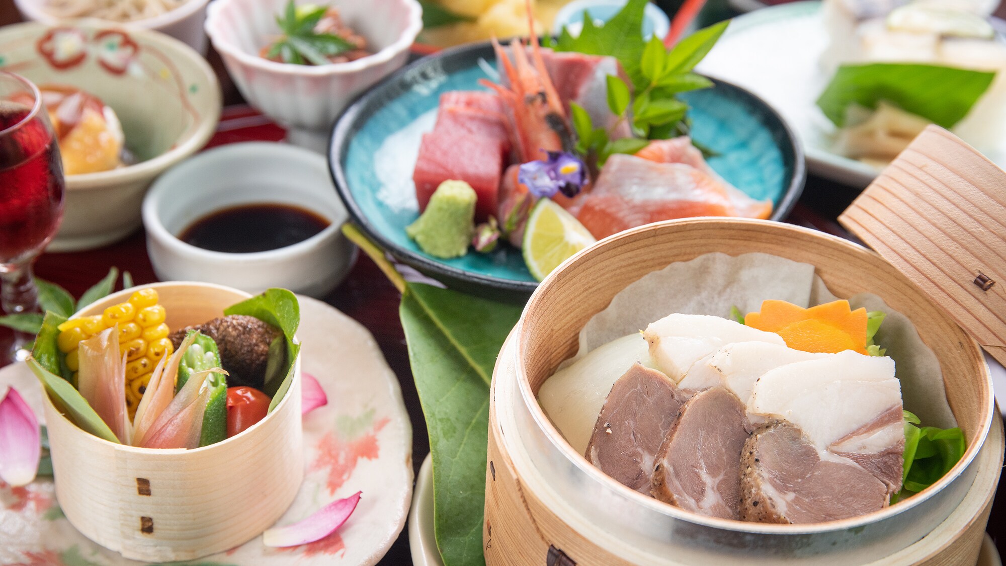 *An example of a standard kaiseki meal. Steamed in a bamboo steamer in summer and wild boar hotpot in winter.