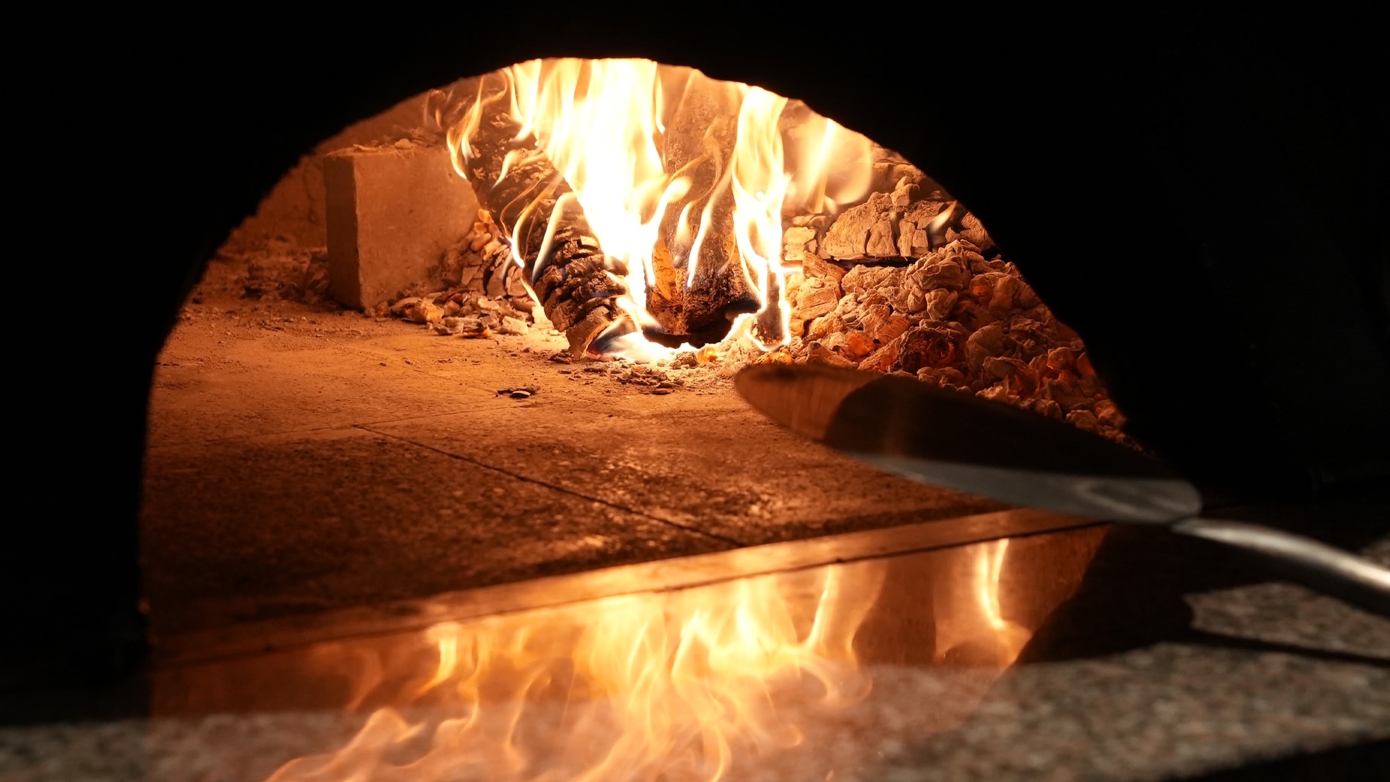Cooking using firewood.