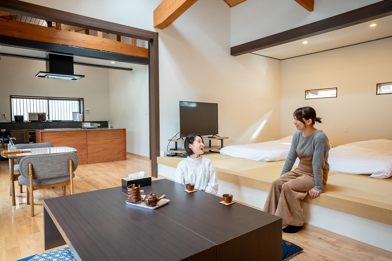Two people relaxing in the living room