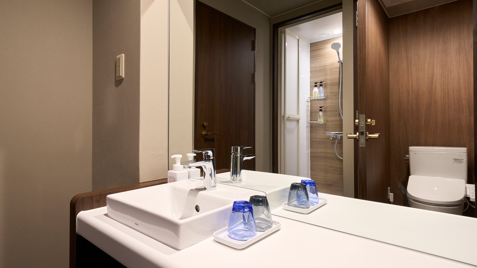 The rooms with shower booths are compact but comfortable with separate toilet, sink and shower booth.