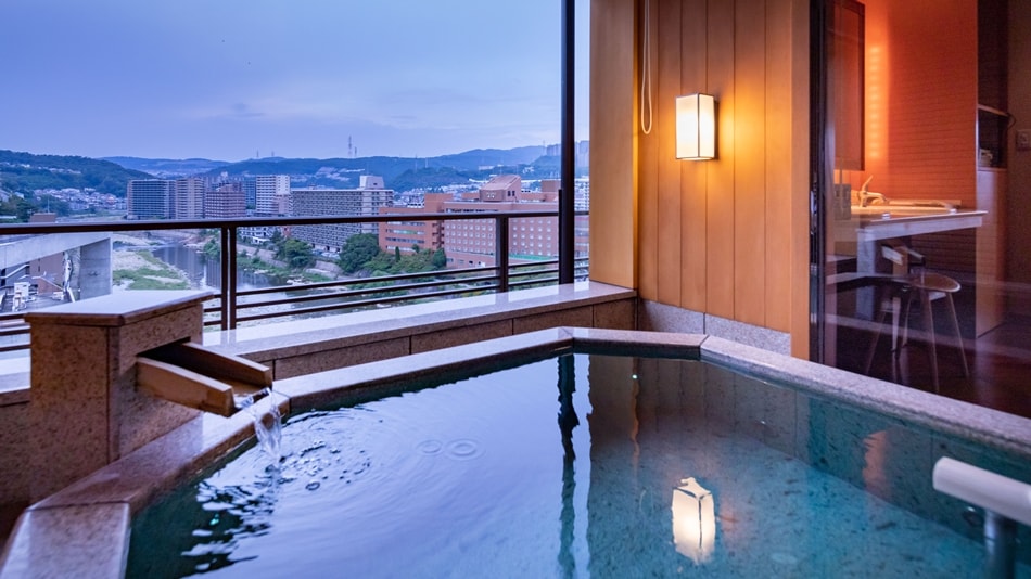 * Modern Japanese guest room No. 702 overlooking the Muko River and Takarazuka Grand Theater