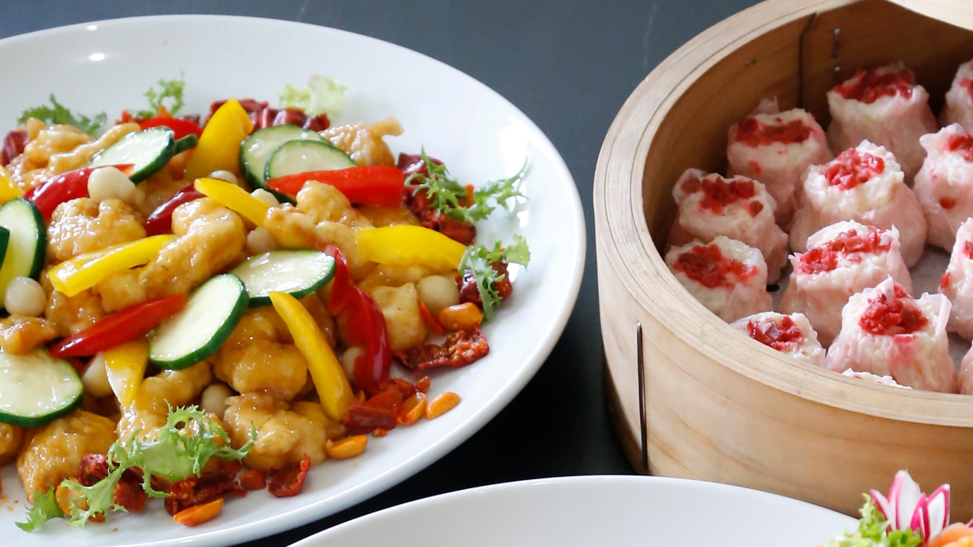 *[Example of a buffet] A buffet filled with authentic Chinese cuisine and dishes using local ingredients