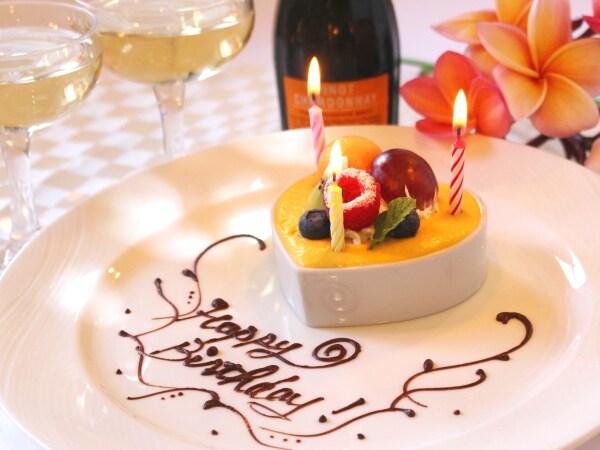 A surprise gift of memorial cake and sparkling wine.